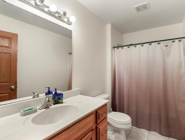 W11065 Menominee Rd, Portage, WI 53901 - full bath featuring vanity, toilet, tile patterned flooring, and a shower with shower curtain