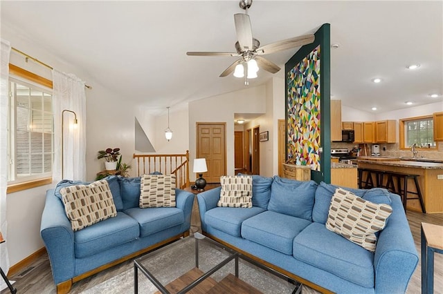 819 Fairway Cir, Black River Falls, WI 54615 - living area featuring ceiling fan, light wood-style flooring, lofted ceiling, recessed lighting, and baseboards