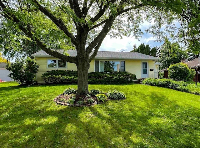4912 Schofield St, Monona, WI 53716 - view of front of house with a front lawn