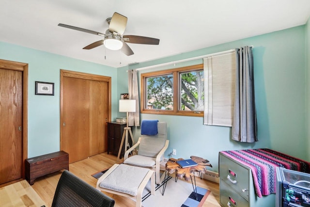 4912 Schofield St, Monona, WI 53716 - office with ceiling fan, wood finished floors, and a baseboard radiator