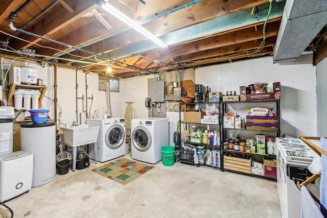 4912 Schofield St, Monona, WI 53716 - unfinished below grade area with independent washer and dryer, a sink, electric panel, and a water softener