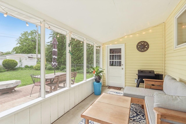 4912 Schofield St, Monona, WI 53716 - sunroom / solarium with outdoor dining space and vaulted ceiling