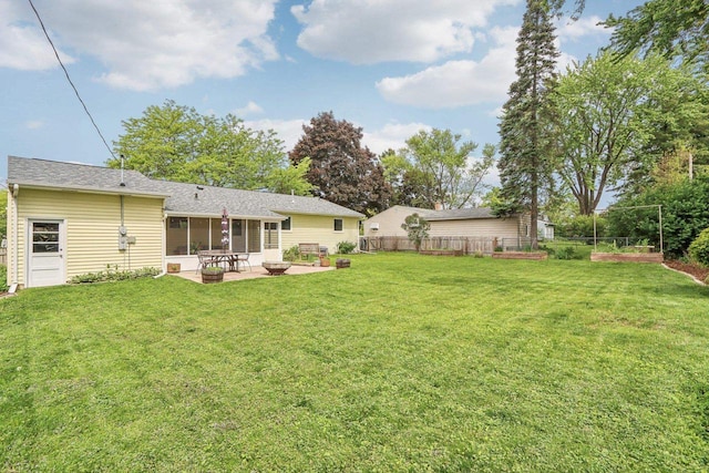 4912 Schofield St, Monona, WI 53716 - view of yard featuring a patio and a sunroom