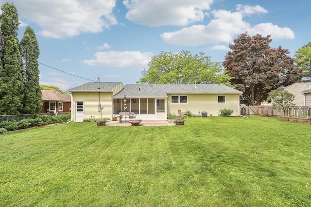 4912 Schofield St, Monona, WI 53716 - back of house with a sunroom and a patio area