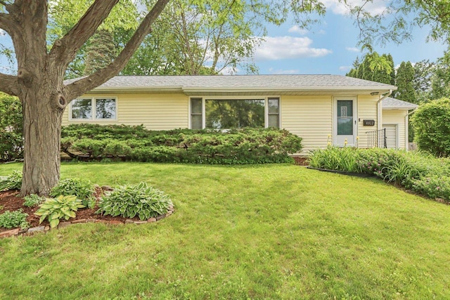 4912 Schofield St, Monona, WI 53716 - ranch-style home featuring a front lawn