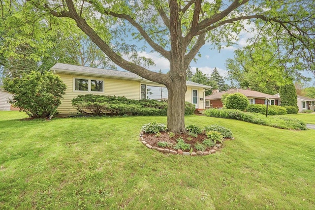 4912 Schofield St, Monona, WI 53716 - view of front of property featuring a front lawn