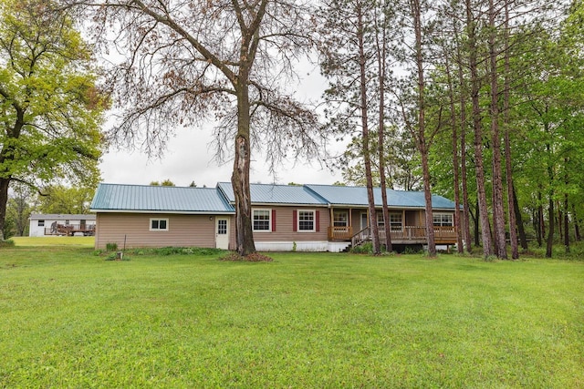 11253 State Highway 71, Sparta, WI 54656 - back of property with a lawn and metal roof