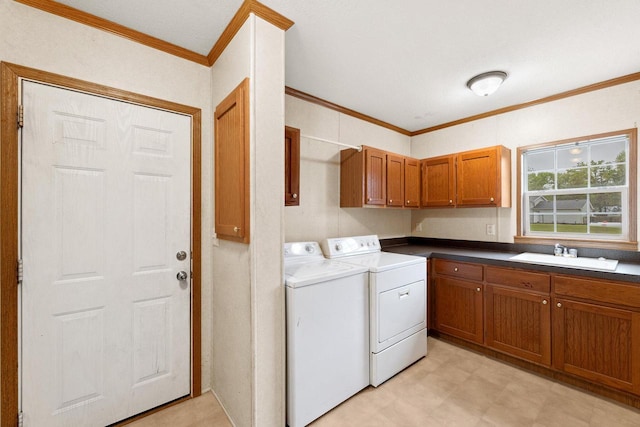 11253 State Highway 71, Sparta, WI 54656 - washroom featuring separate washer and dryer, cabinet space, ornamental molding, and light floors