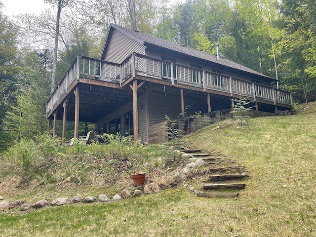 17235 Little Archibald Rd, Townsend, WI 54175 - view of side of home with a deck and a yard
