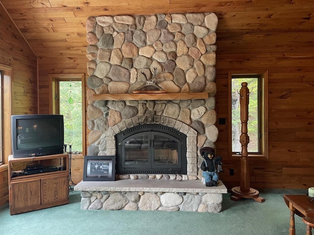 17235 Little Archibald Rd, Townsend, WI 54175 - detailed view of carpet floors, a stone fireplace, wood walls, and wooden ceiling