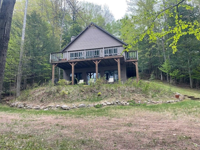 17235 Little Archibald Rd, Townsend, WI 54175 - rear view of property with a deck and a forest view