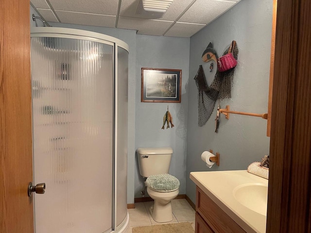 17235 Little Archibald Rd, Townsend, WI 54175 - full bath with tile patterned flooring, a stall shower, vanity, a drop ceiling, and toilet