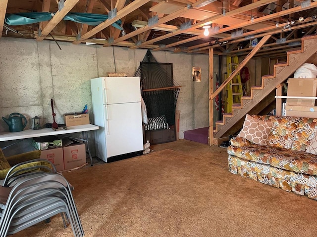 17235 Little Archibald Rd, Townsend, WI 54175 - basement with freestanding refrigerator, stairs, and carpet flooring