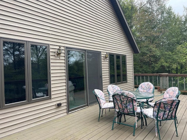 17235 Little Archibald Rd, Townsend, WI 54175 - wooden terrace featuring outdoor dining area