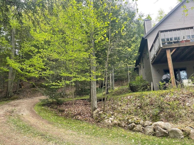 17235 Little Archibald Rd, Townsend, WI 54175 - view of yard with a wooden deck and a forest view