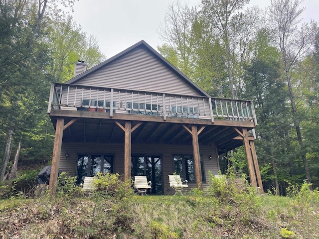 17235 Little Archibald Rd, Townsend, WI 54175 - back of house featuring a chimney and a wooden deck