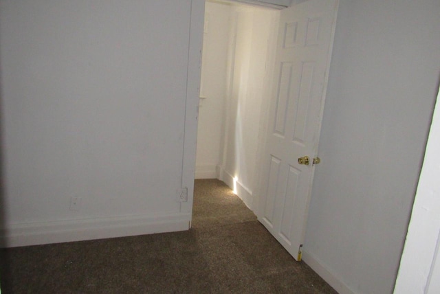 1817 N 22nd St Unit 1819, Milwaukee, WI 53205 - unfurnished room featuring dark carpet and baseboards