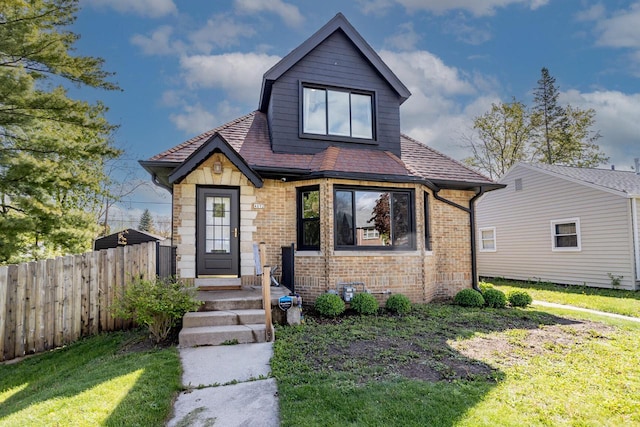 4892 N Mohawk Ave, Glendale, WI 53217 - view of front of home with brick siding and roof with shingles