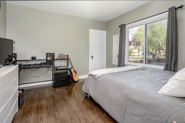 4892 N Mohawk Ave, Glendale, WI 53217 - bedroom with dark wood-style floors, baseboards, and an office area