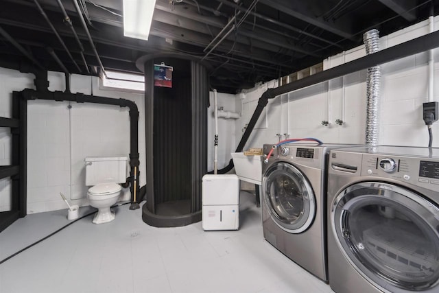1523 N Lynndale Dr, Appleton, WI 54914 - washroom featuring washer and dryer and concrete block wall