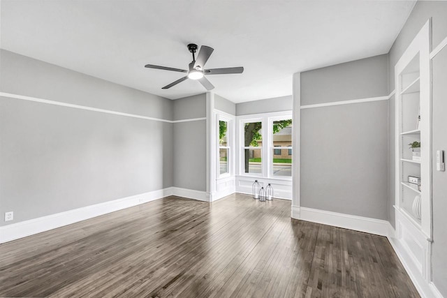 60 Brix St, Clintonville, WI 54929 - unfurnished room with wood finished floors, baseboards, and a ceiling fan