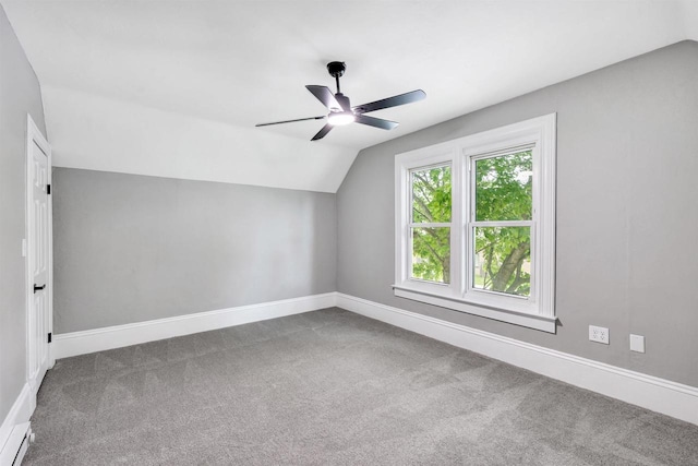 60 Brix St, Clintonville, WI 54929 - bonus room featuring carpet flooring, lofted ceiling, baseboards, and a ceiling fan