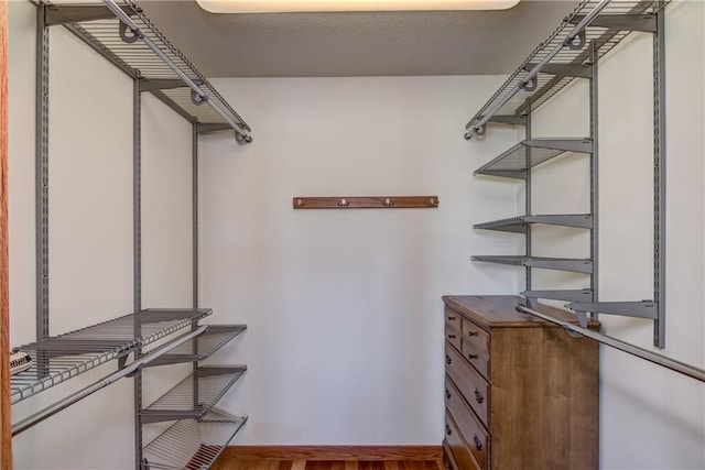 1816 186th St, Chippewa Falls, WI 54729 - walk in closet featuring wood finished floors