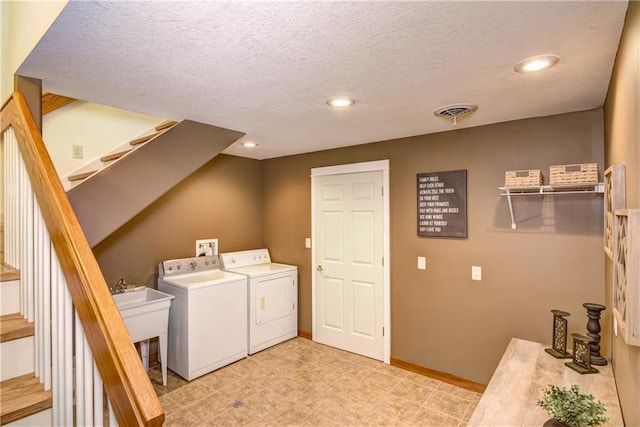 1816 186th St, Chippewa Falls, WI 54729 - laundry room featuring washing machine and clothes dryer, recessed lighting, and a textured ceiling