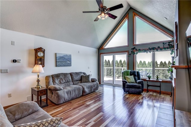1816 186th St, Chippewa Falls, WI 54729 - living area with ceiling fan, hardwood / wood-style floors, and high vaulted ceiling