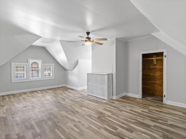 4101 N 14th St, Milwaukee, WI 53209 - bonus room with ceiling fan, lofted ceiling, wood finished floors, and baseboards