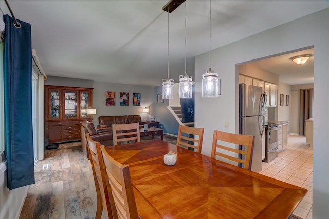 3514 Valley Ridge Rd, Middleton, WI 53562 - dining area with stairs and light wood finished floors