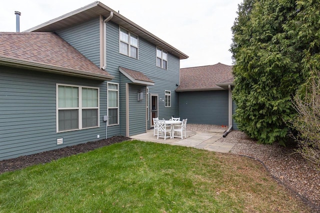 141 Cavil Way, De Pere, WI 54115 - rear view of house with roof with shingles, a lawn, and a patio