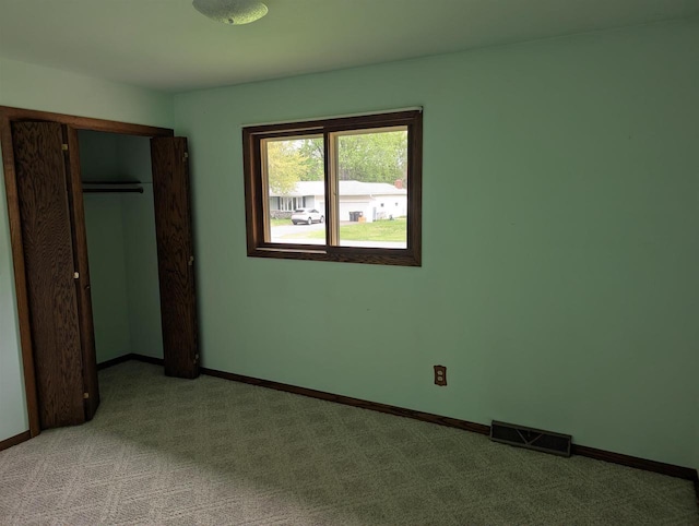 1741 Heuss Ave, Weston, WI 54476 - unfurnished bedroom featuring light colored carpet, baseboards, and a closet