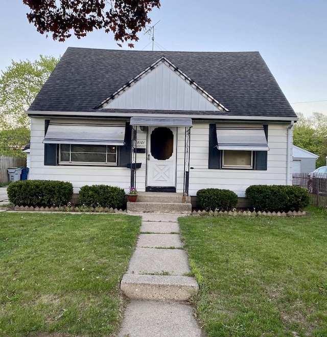 8101 W Kathryn Ave, Milwaukee, WI 53218 - view of front facade featuring roof with shingles