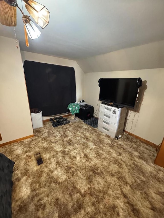 8101 W Kathryn Ave, Milwaukee, WI 53218 - living area with vaulted ceiling, carpet, and baseboards