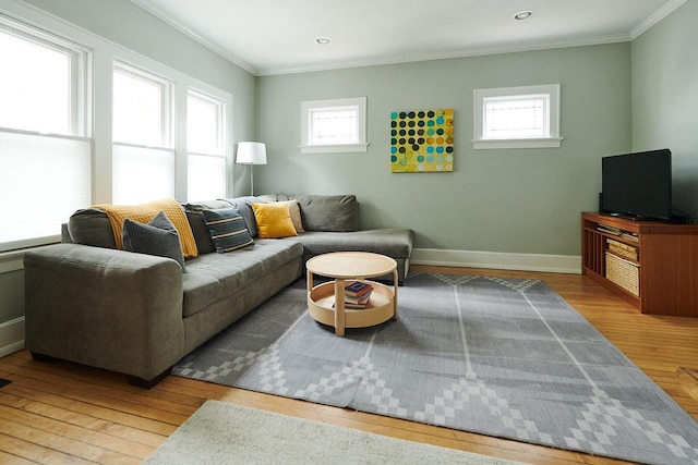 1605 E Webster Pl, Milwaukee, WI 53211 - living area with ornamental molding, hardwood / wood-style flooring, healthy amount of natural light, and baseboards