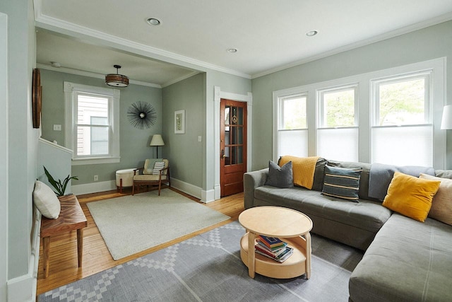 1605 E Webster Pl, Milwaukee, WI 53211 - living room with wood finished floors, baseboards, ornamental molding, and recessed lighting