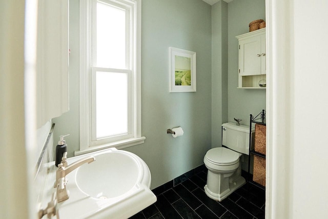 1605 E Webster Pl, Milwaukee, WI 53211 - bathroom with toilet and tile patterned floors