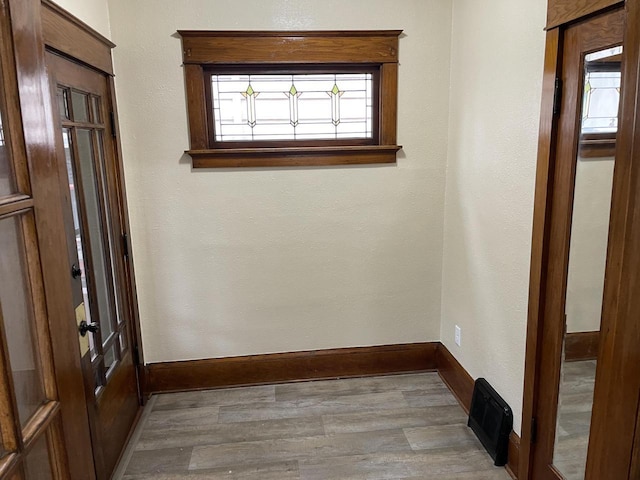 3122 W Madison St, Milwaukee, WI 53215 - empty room with baseboards and wood finished floors