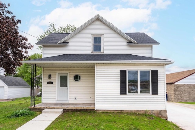 815 Madison St, Little Chute, WI 54140 - view of front of property with a porch, a front lawn, and roof with shingles