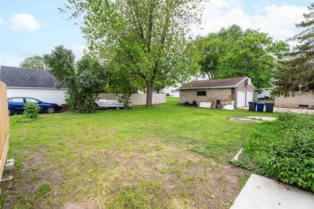 815 Madison St, Little Chute, WI 54140 - view of yard featuring a detached garage and an outdoor structure