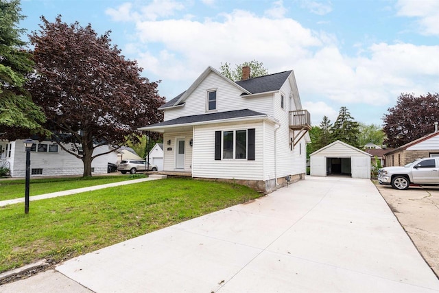 815 Madison St, Little Chute, WI 54140 - traditional home featuring a garage, a front yard, an outbuilding, a chimney, and a shingled roof