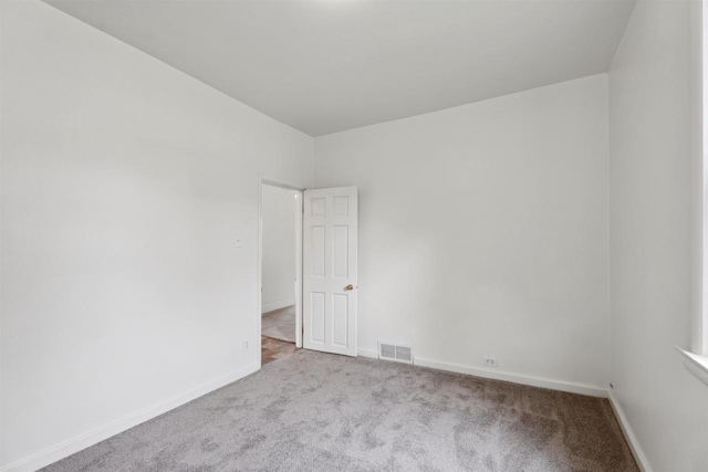 815 Madison St, Little Chute, WI 54140 - carpeted empty room featuring baseboards