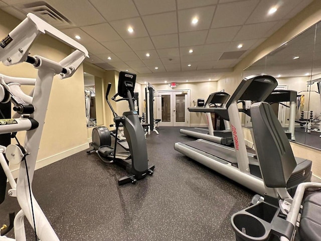 1028 E Juneau Ave Unit 204-206, Milwaukee, WI 53202 - gym featuring baseboards, recessed lighting, and a paneled ceiling