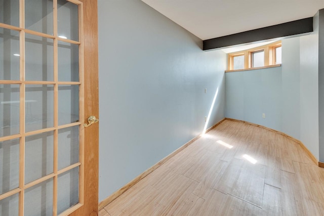 69 Ponwood Cir, Madison, WI 53717 - unfurnished room with wood finished floors and baseboards