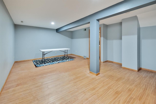 69 Ponwood Cir, Madison, WI 53717 - finished basement with wood finished floors, baseboards, and recessed lighting