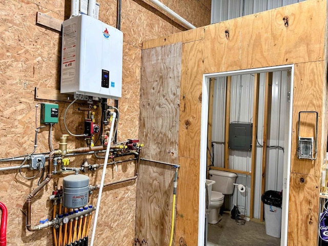 11691 County Road P, Bagley, WI 53801 - utility room featuring tankless water heater and electric panel
