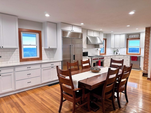 11691 County Road P, Bagley, WI 53801 - dining area featuring healthy amount of natural light, light wood-style floors, and recessed lighting