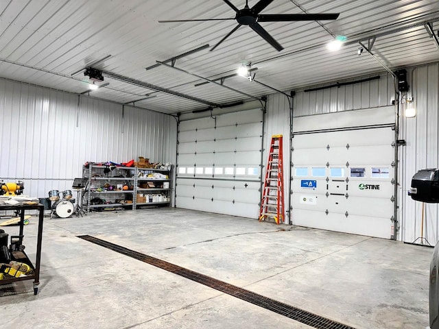 11691 County Road P, Bagley, WI 53801 - garage featuring a garage door opener and ceiling fan