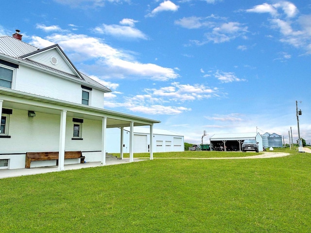 11691 County Road P, Bagley, WI 53801 - view of grassy yard featuring a porch